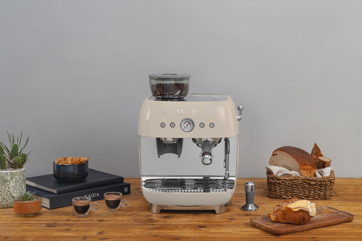 Espresso coffee machines with a grinder