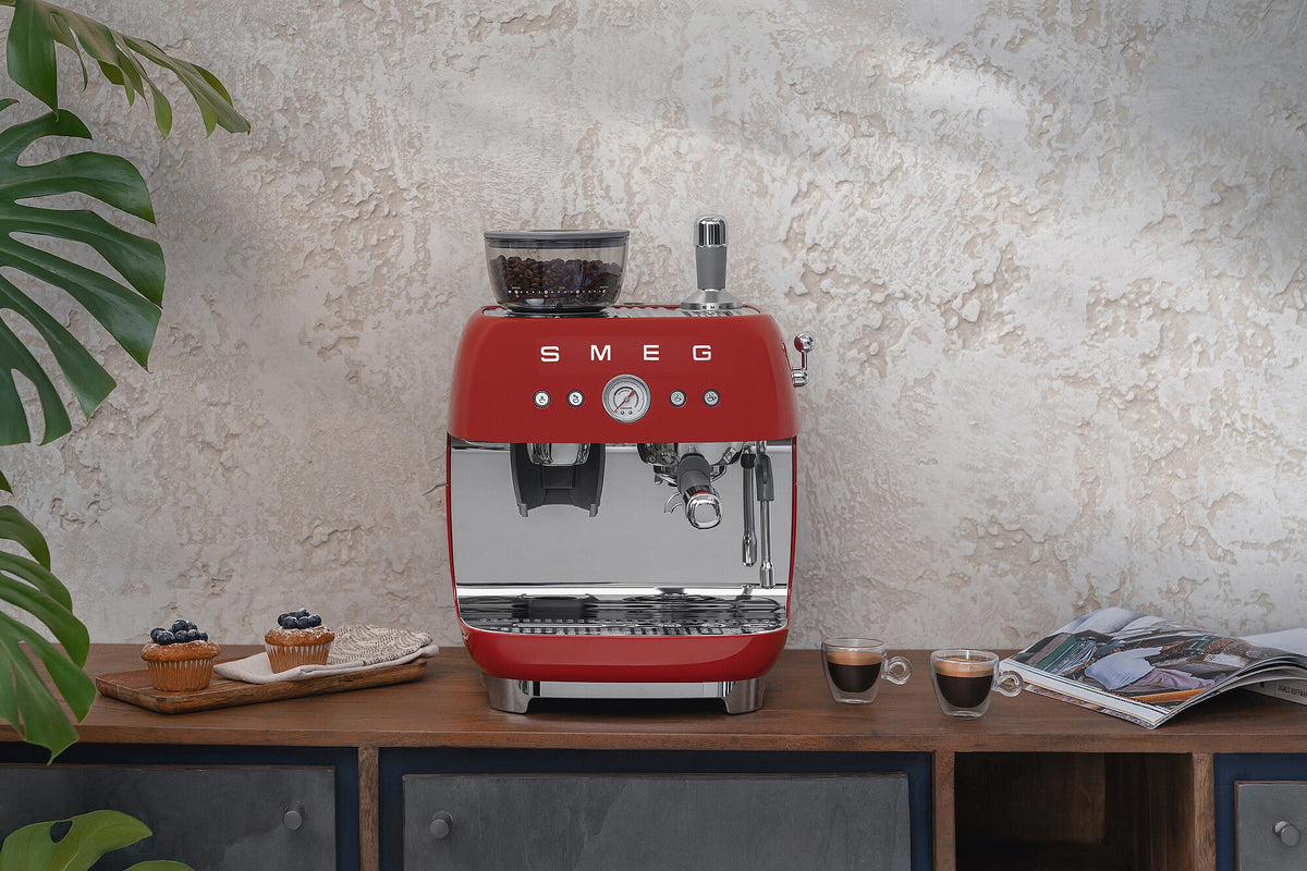 Espresso coffee machines with a grinder